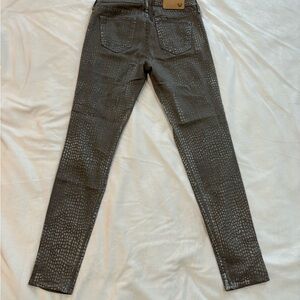 True Religion women jeans. Greyish print. Like new. Size 24.
